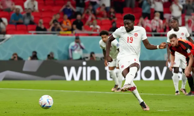 Alphonso Davies of Canada takes a penalty against Belgium in a Group F fixture at the 2022 World Cup in Qatar.  
